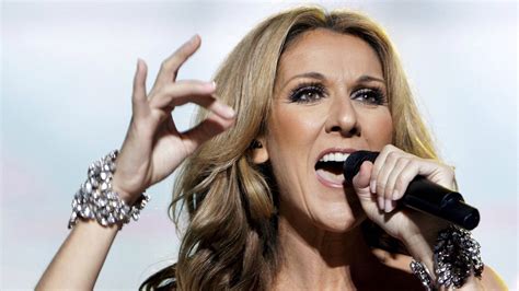 red wristband celine dion|Celine Dion singing.